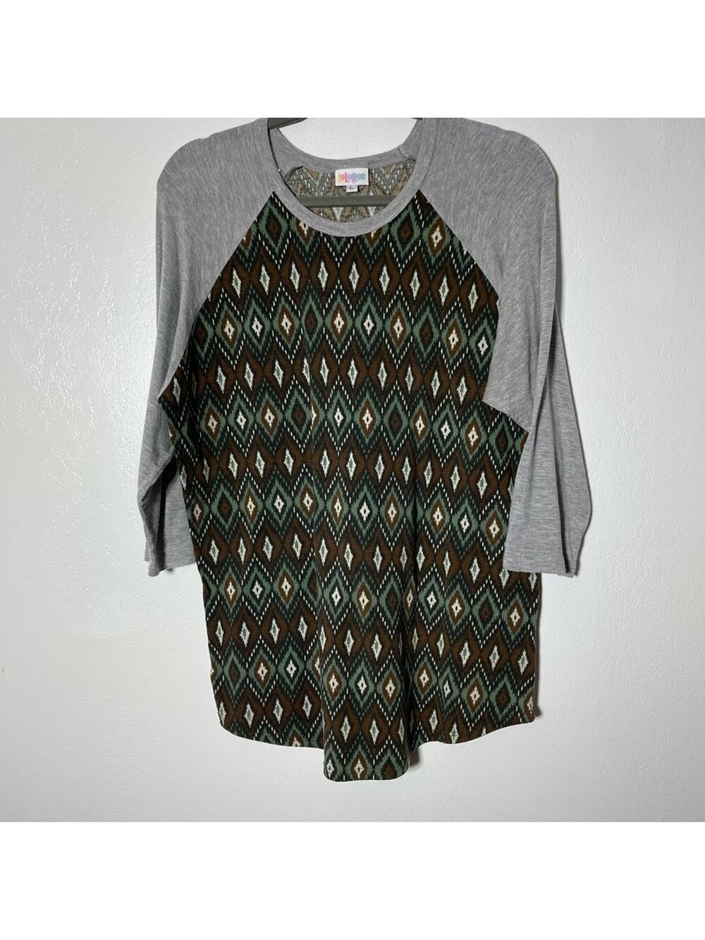 LuLaRoe, Vintage Print Randy Raglan Shirt. Size Large. In good used condition!
